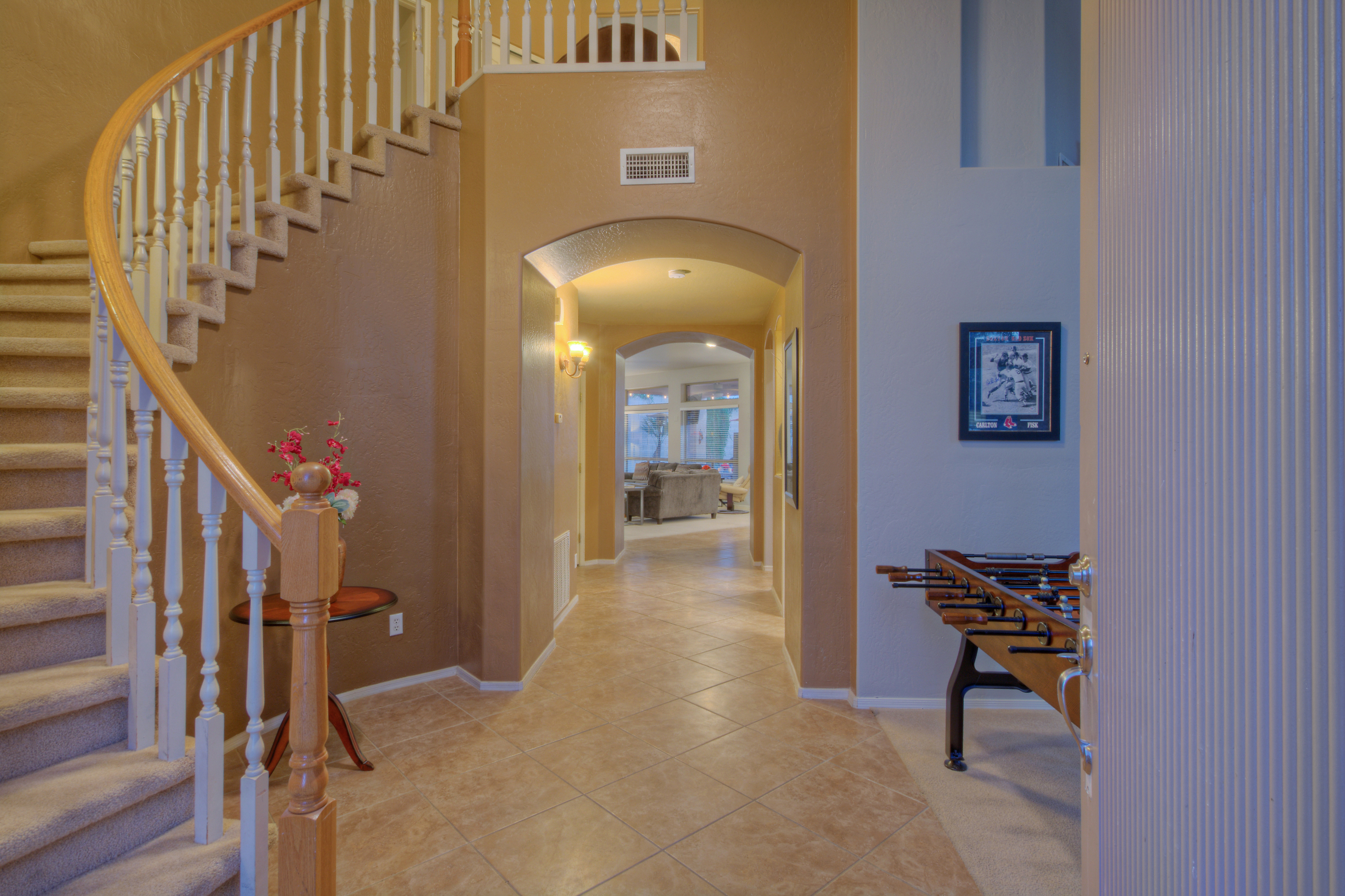Front entrance foyer hints at home's elegant interior and many appealing features.