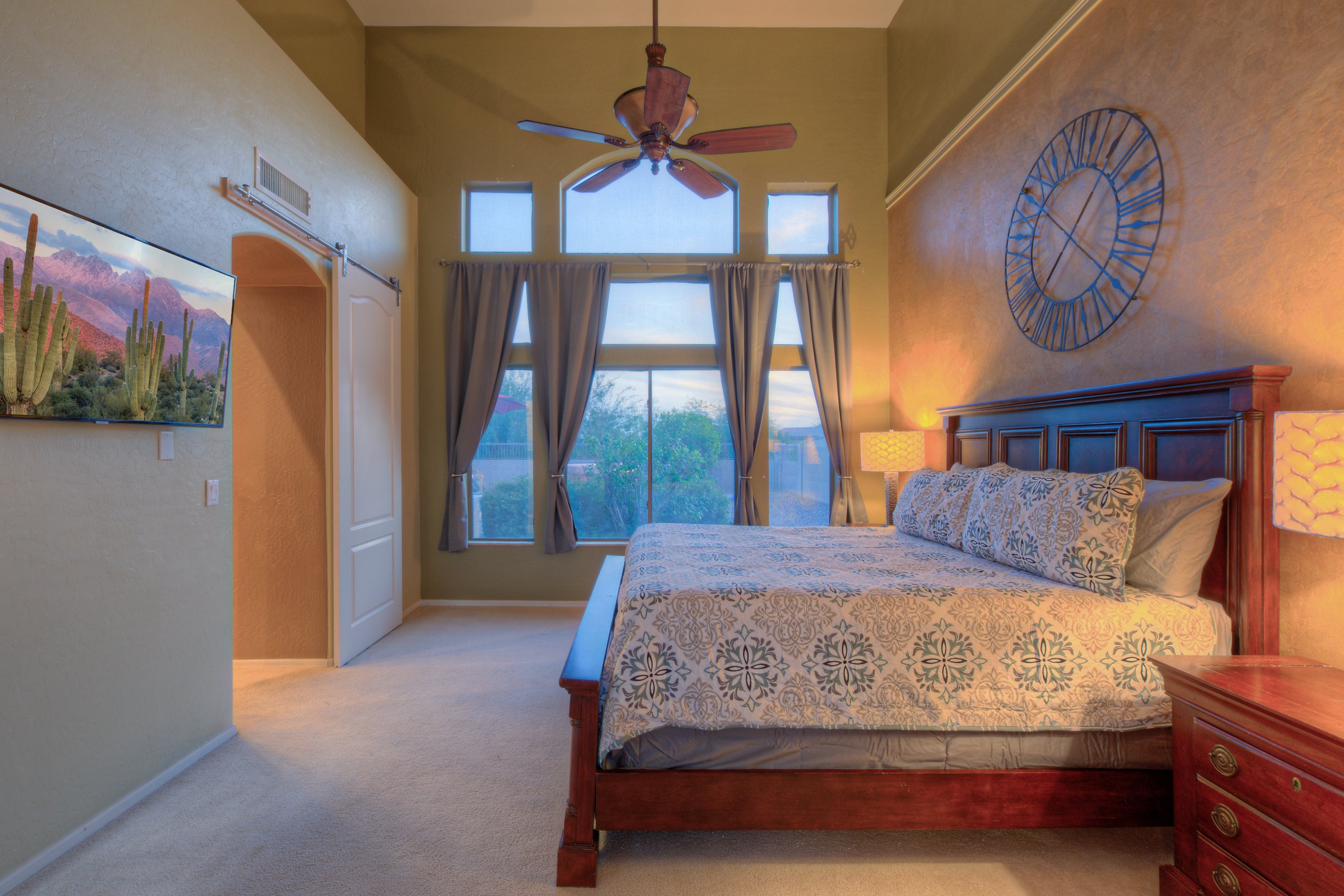 Seventh bedroom is on the ground floor and has a king bed, trey ceiling and magical view.