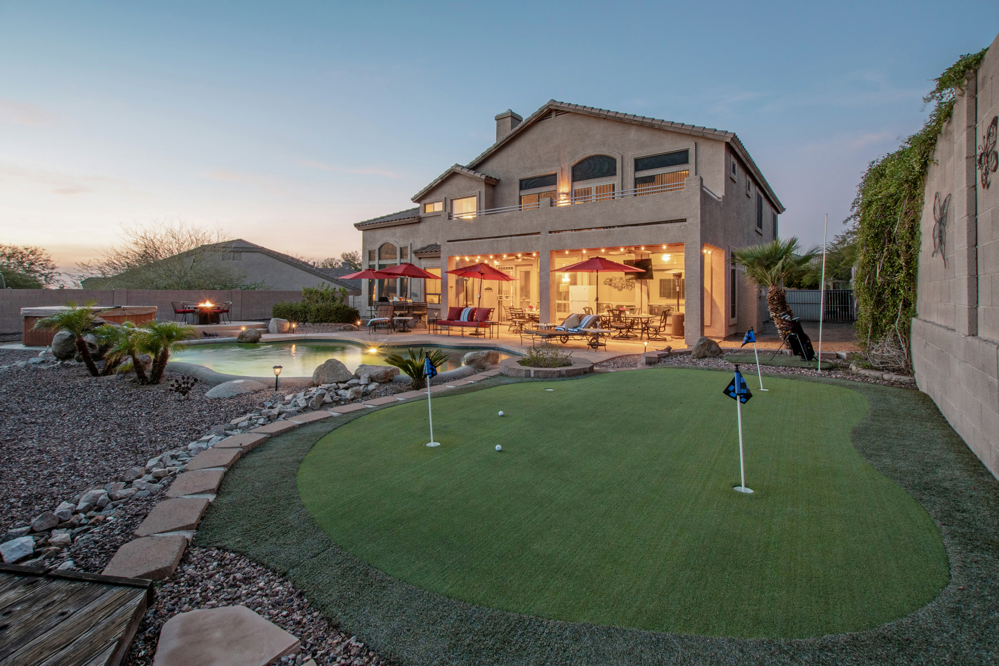 Warm up your shots on the private putting green before heading to one of many nearby courses.