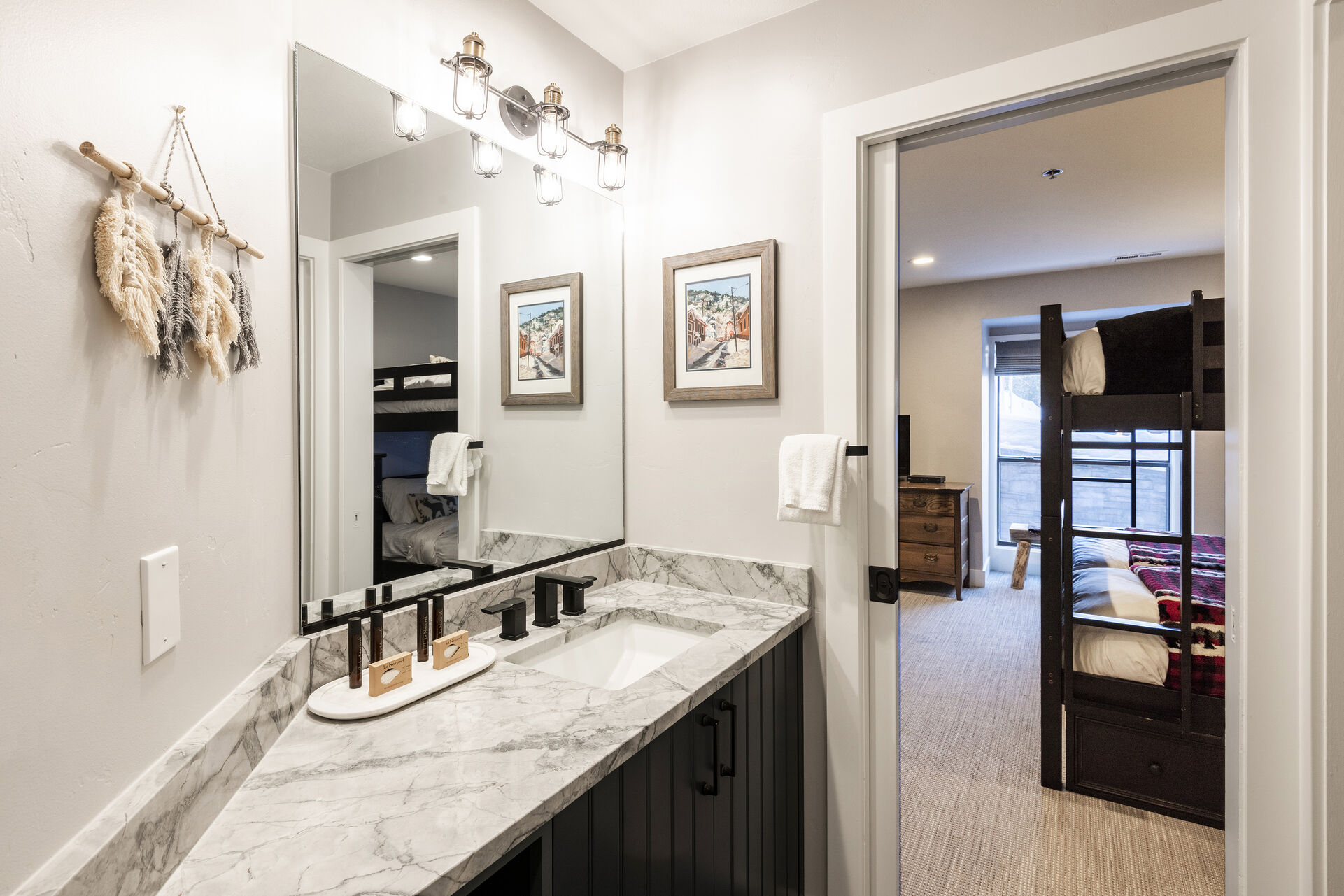 Private Entrance to Full Shared Bath with Stone Top Sink and a Separate Tub/Shower Combo