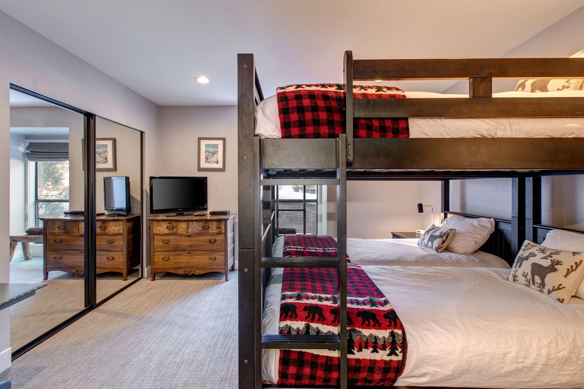 Bunk Room with Two Twin over Twin Bunk Beds, Smart TV, and Private Access to a Full Shared Bath