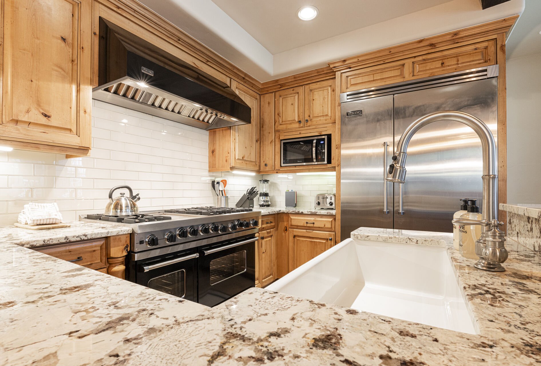Gourmet Kitchen with Viking Appliances, Including a 6-Burner Gas Range with a Griddle and Double Ovens