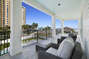 This Destin Vacation Rentals Miramar Beach feature seating on the balcony