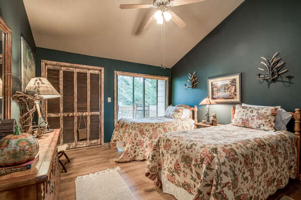 Guest bedroom on main level with two twin beds