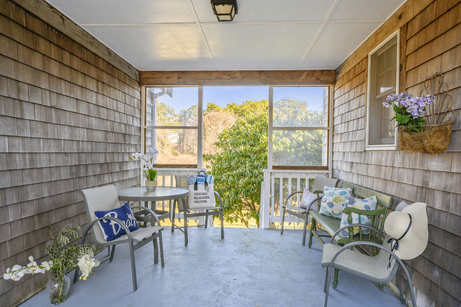 Shady spot on the porch - great for and afternoon cup of tea! 67 The Cornfield Chatham Cape Cod - New England Vacation Rentals