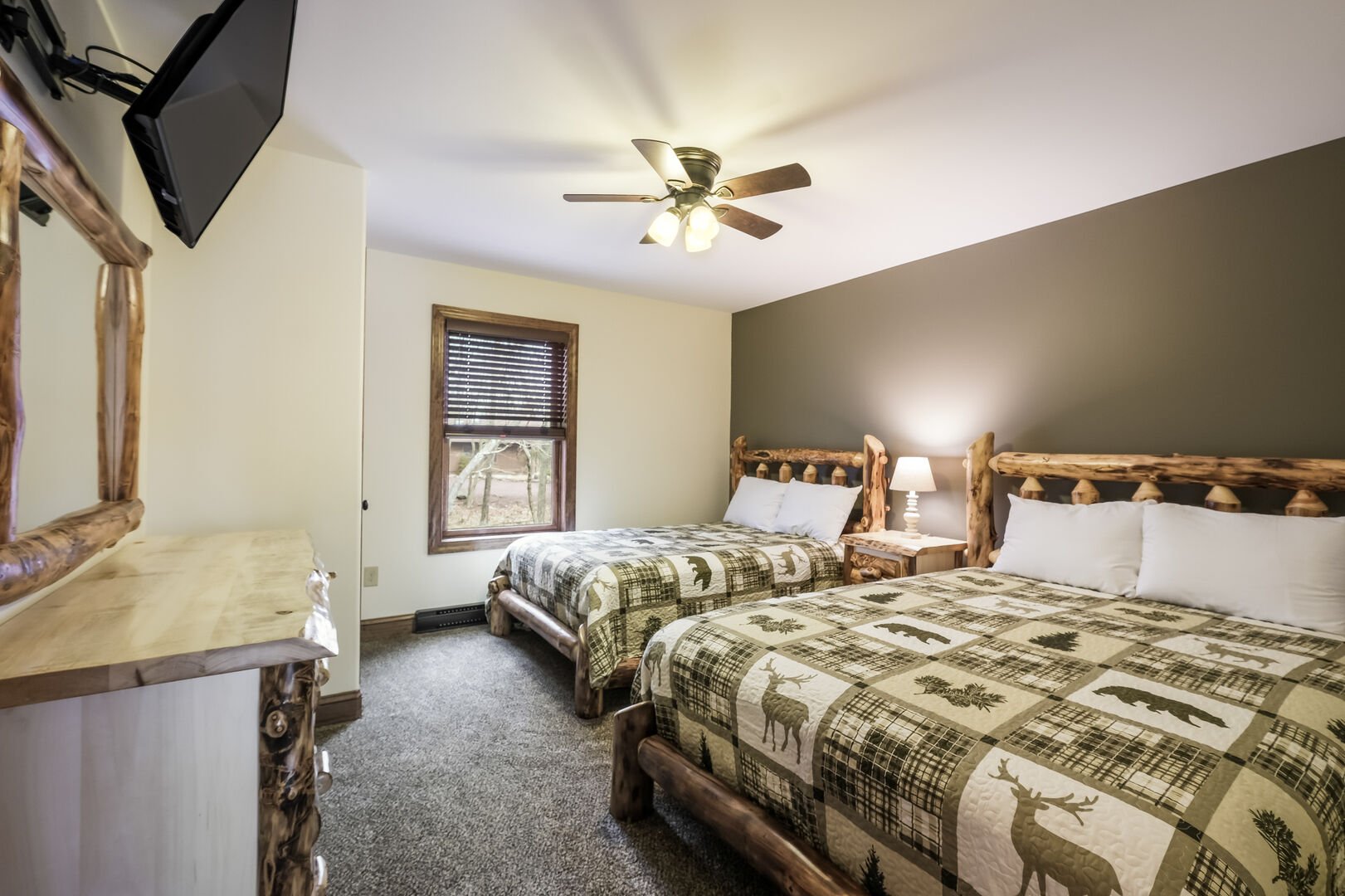 Large Bedroom with Two Elk Patterned Beds