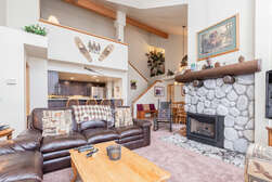 Living Room / TV / Gas Fireplace / Dining Room