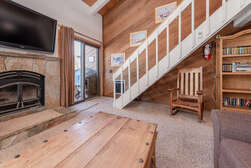 Living Room/Wood Burning Fireplace/Flat Screen TV/Stairs up to Loft