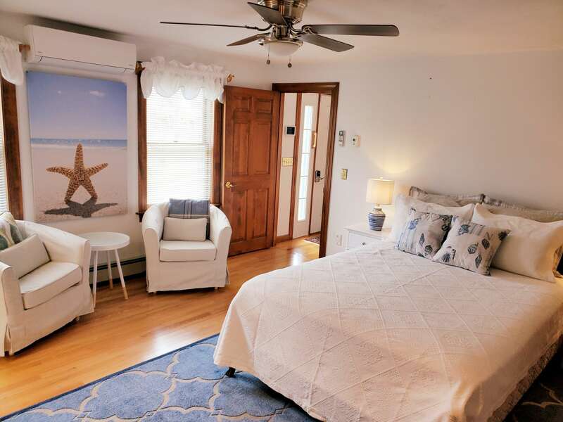 Bedroom #1 with fan and coast decor.   335 Meeting House Rd- Chatham- New England Vacation Rentals