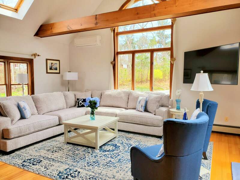 Large living room windows to let in the natural light.  335 Meeting House Rd- Chatham- New England Vacation Rentals