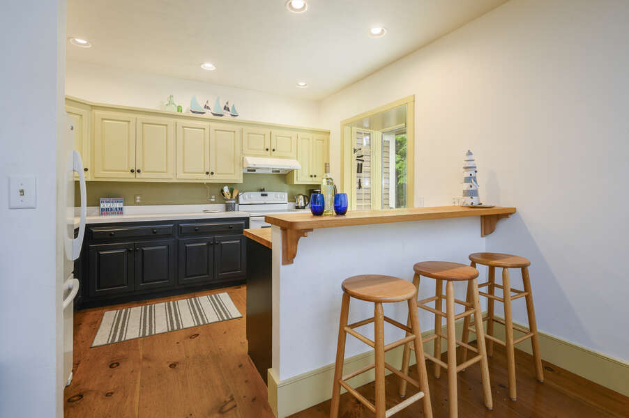 Kitchen with breakfast bar seating for 3- 9 Reliance Way Harwich Cape Cod - New England Vacation Rentals-#BookNEVRDirectNormasCapeEscape