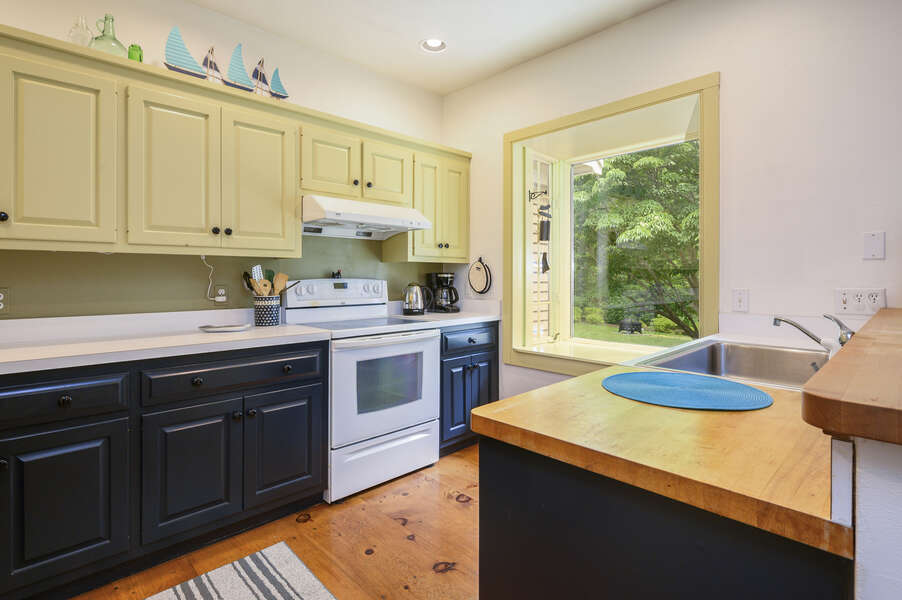 Kitchen with stove- 9 Reliance Way Harwich Cape Cod - New England Vacation Rentals-#BookNEVRDirectNormasCapeEscape