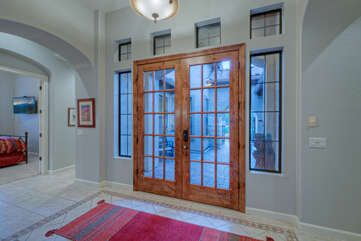 Entrance foyer splits the primary suite from the 2 other bedrooms creating desirable privacy.
