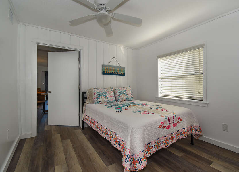 Large bed and ceiling fan