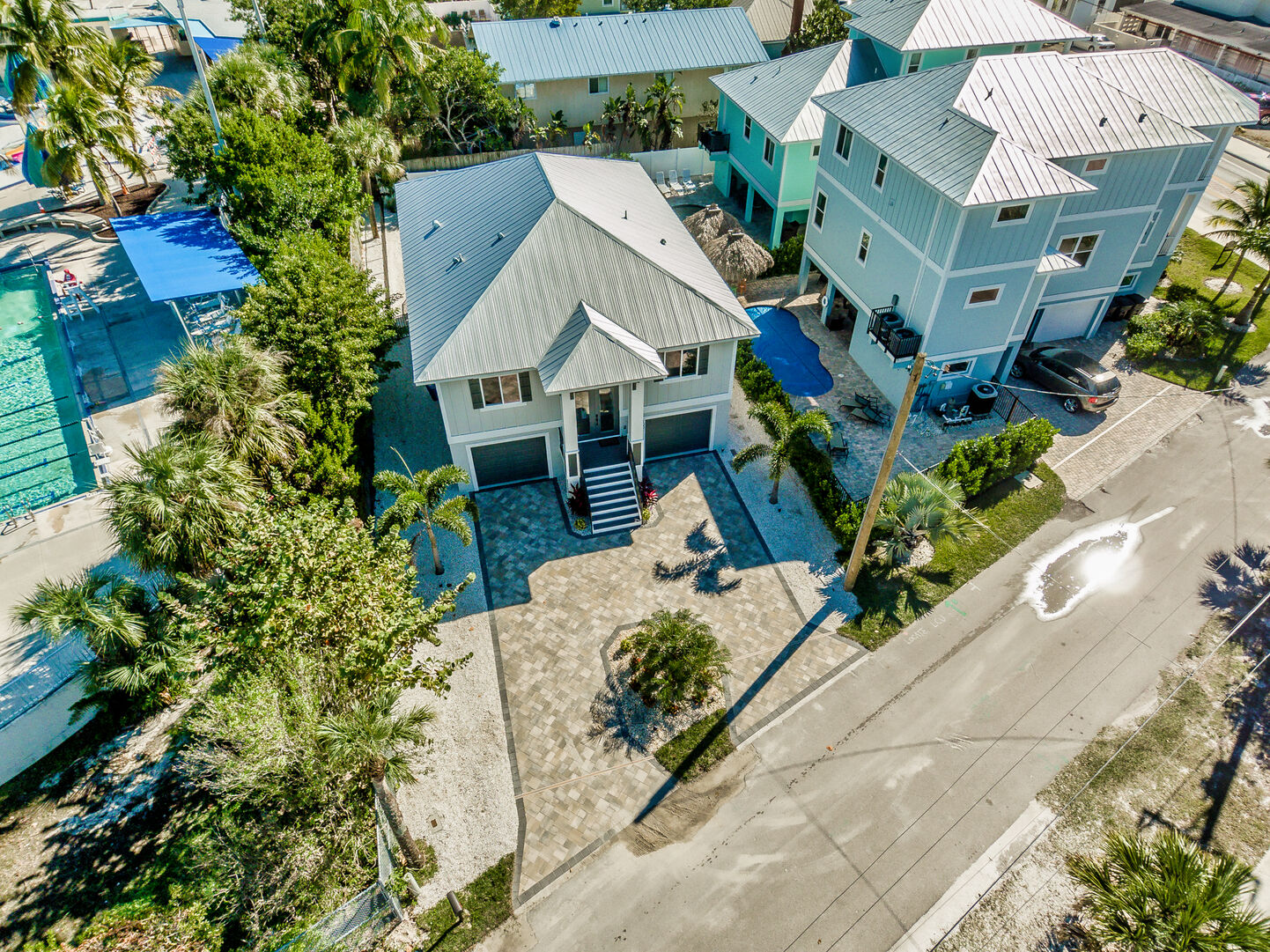 Aerial View of Gulf Beach House Including Street