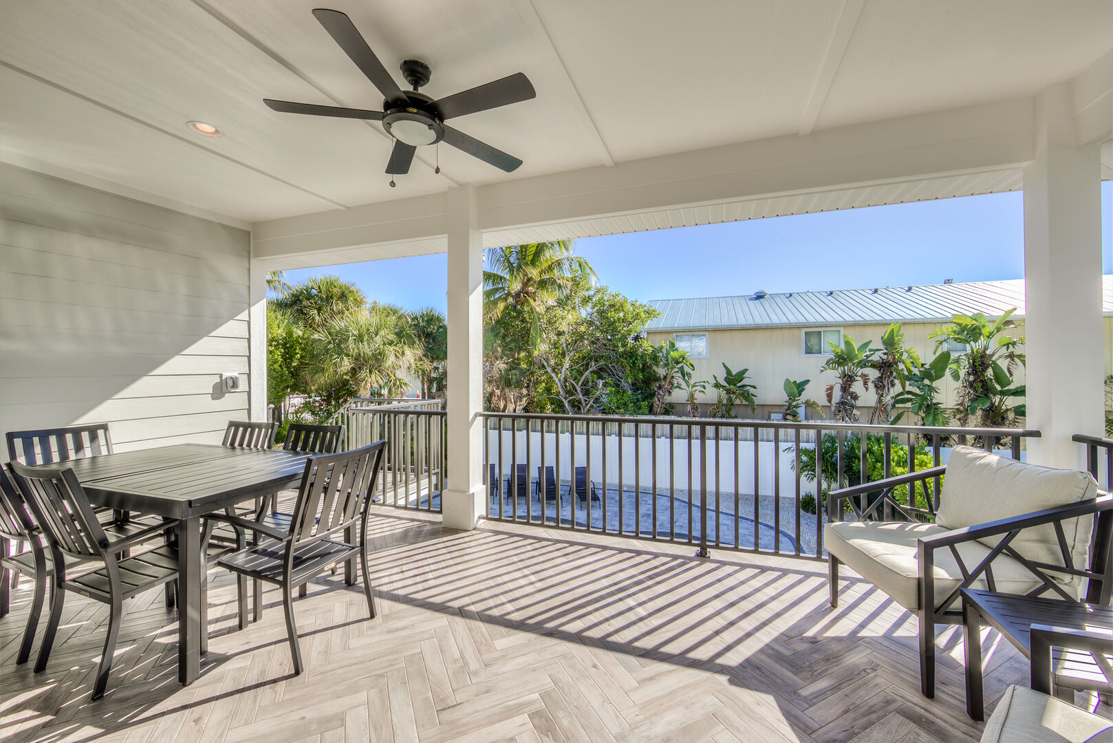 Outside Deck with Plenty of Seating Fort Myers Beachfront Vacation Rental