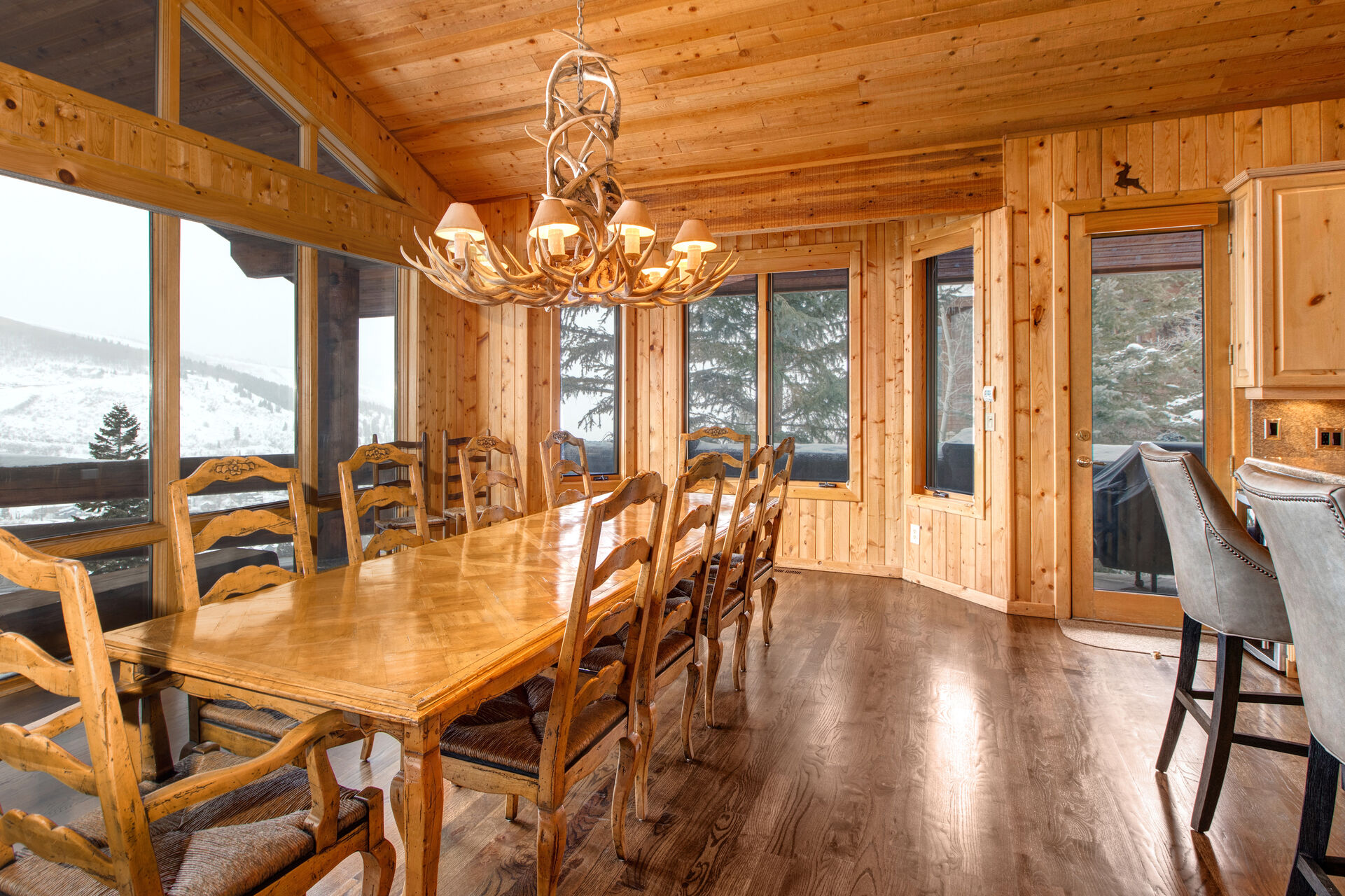 Floor-to-Ceiling Windows for Plenty of Natural Light and a Side Deck with a BBQ