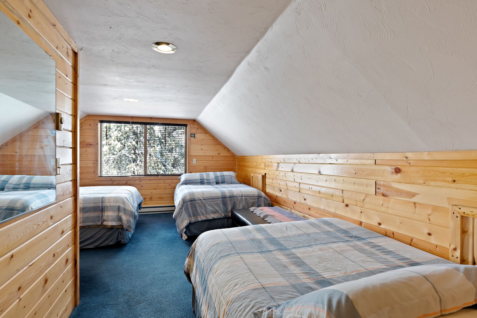 Restoration Pines ~ bedroom #3 on upper level w/ queen bed and 2 double beds and private entrance to shared bathroom