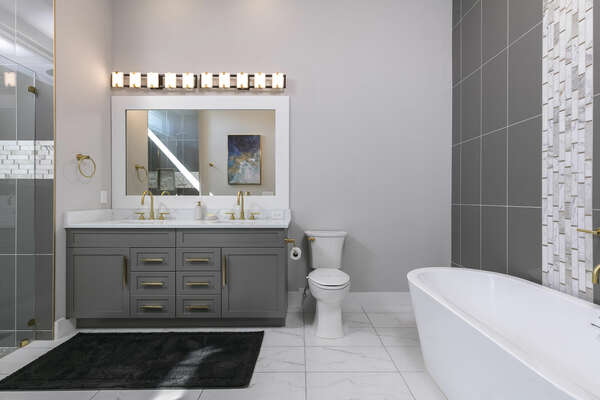 Get ready in this beautiful master bathroom. Large walk-in shower with a rainfall shower head