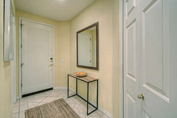 Entrance foyer hints at home's attention to details in decor and amenities.