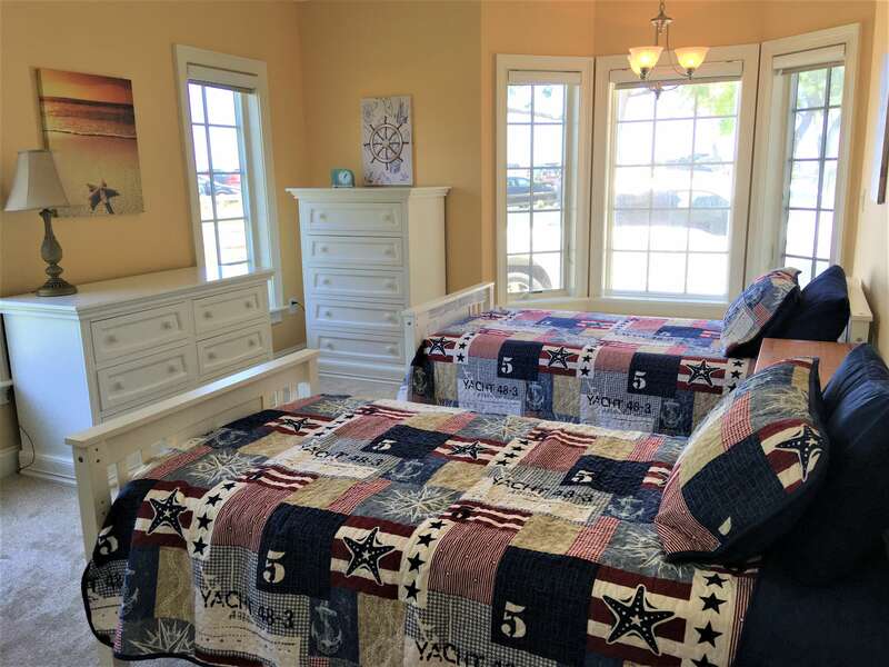 Bedroom #3 with 2 twin beds, ensuite bathroom with shower. 306 Millway Barnstable