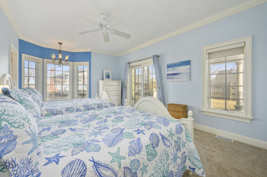 Bedroom #2 with 2 double beds, ceiling fan, and ensuite bathroom with shower-306 Millway Barnstable