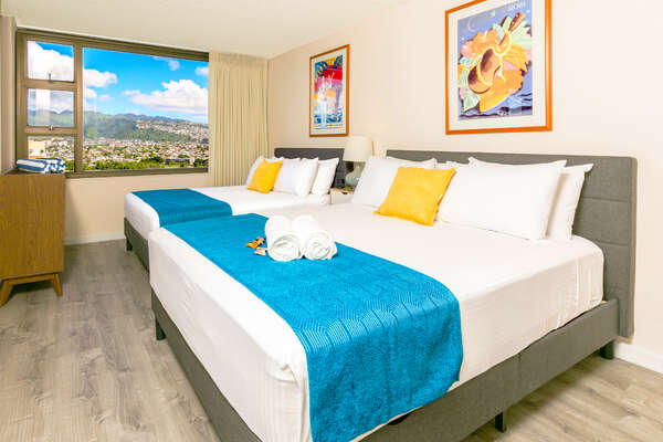 Bedroom with 2 beds (1 full size and 1 queen size) and beautiful Mountain views