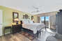 Master Bedroom with King Size Bed and Private Access to Balcony overlooking the Gulf