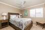Take a load off in this queen guest room on the mainfloor