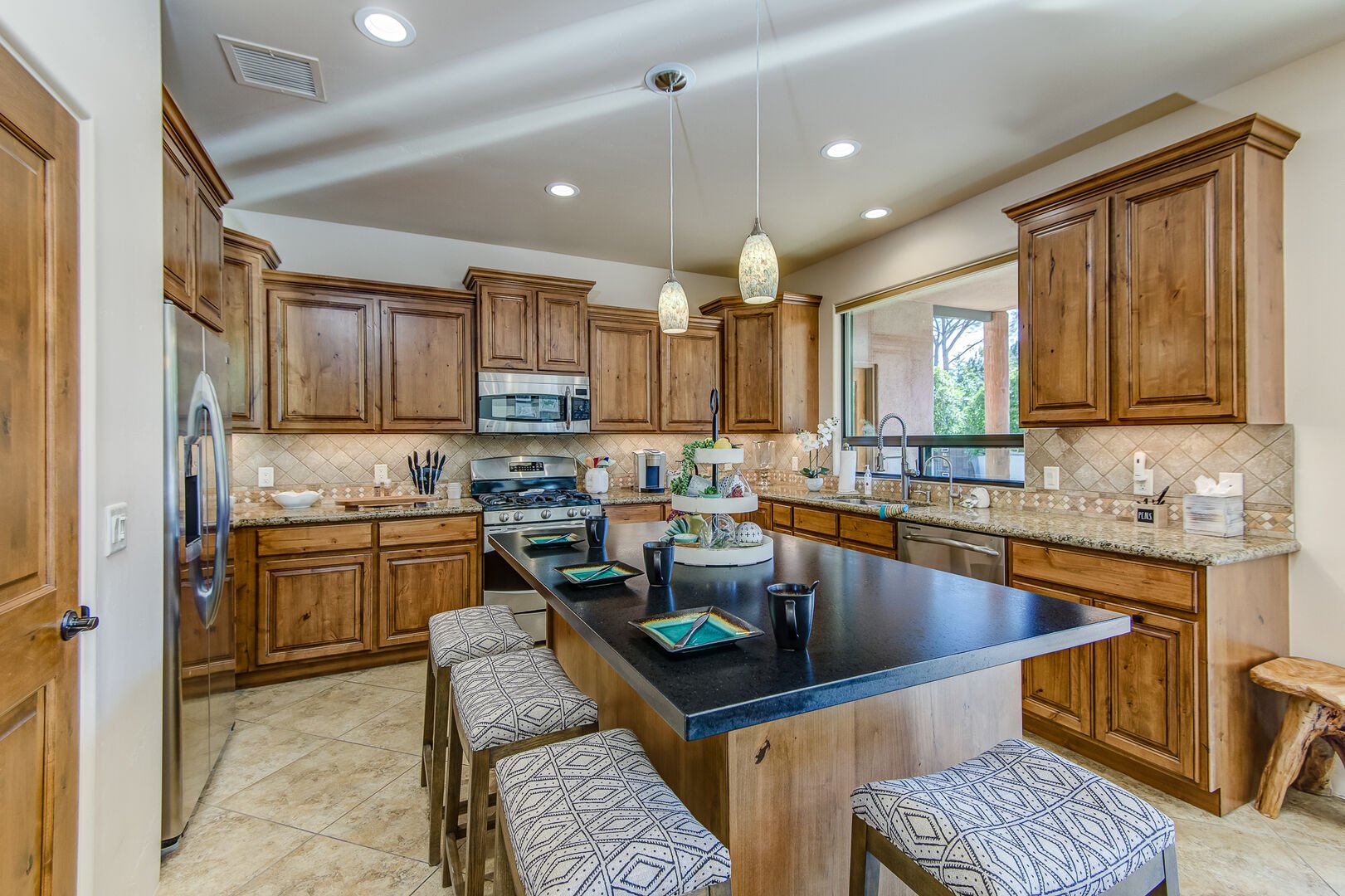 Plenty of Counter Space Including a Large Center Island with Seating for Four