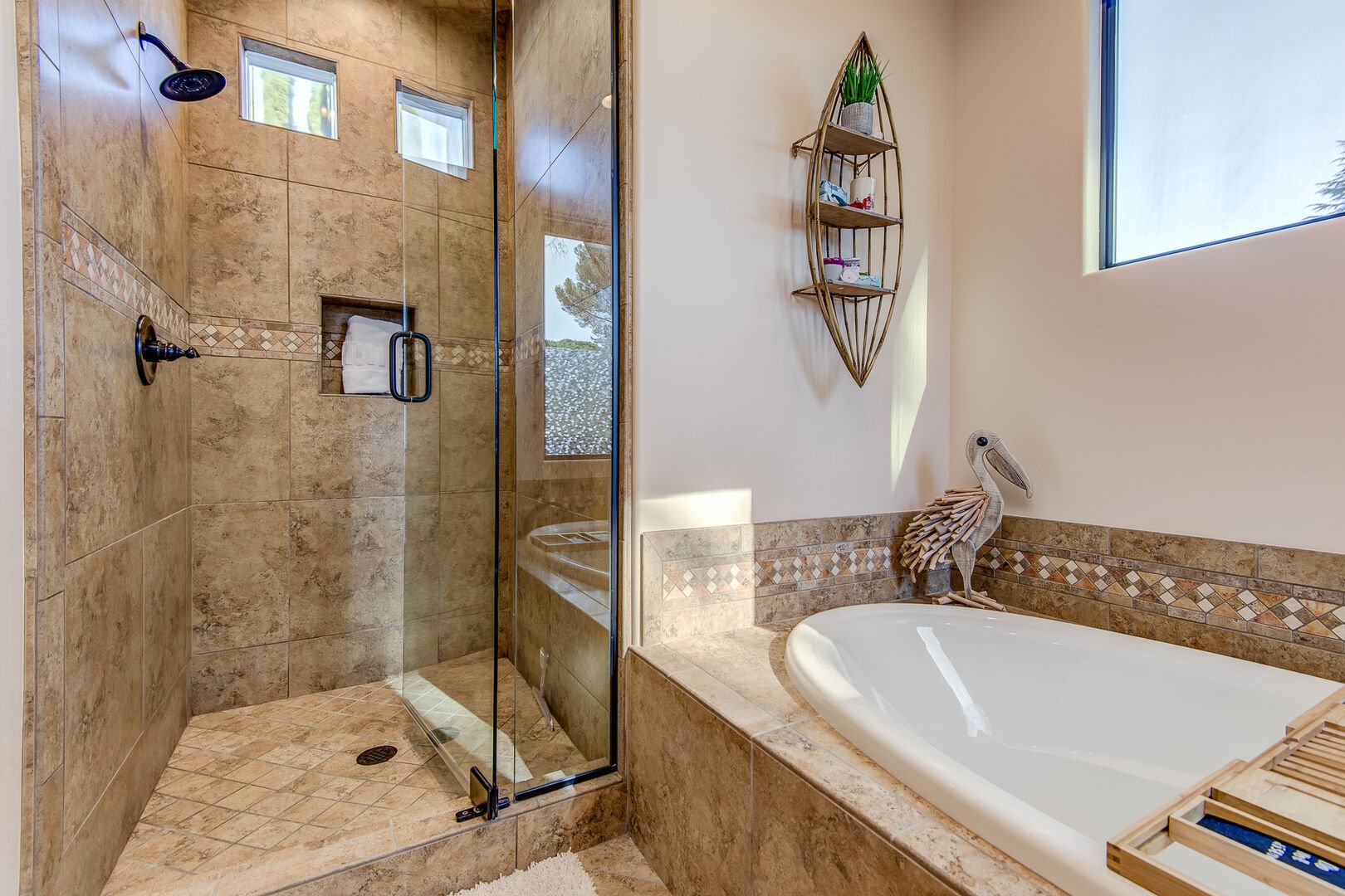 Master Bath with a Large Soaking Tub and a Marble Tile Shower