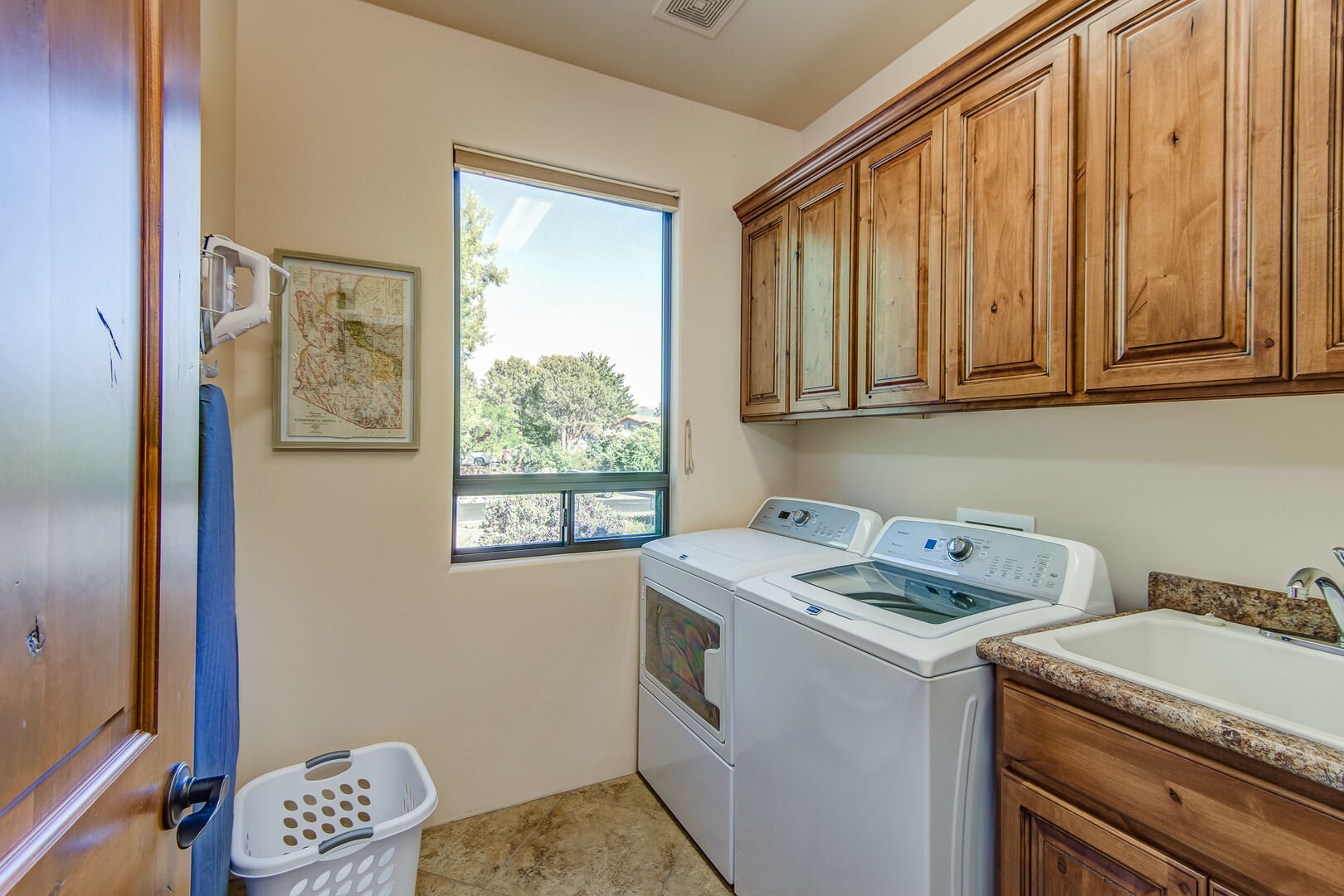 Laundry Room with a Full Size Washer, Dryer and Sink...with Red Rock Views