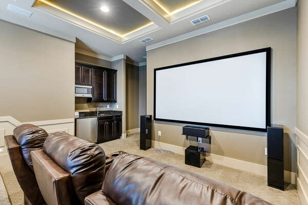 Enjoy a favorite movie in the private home theater room