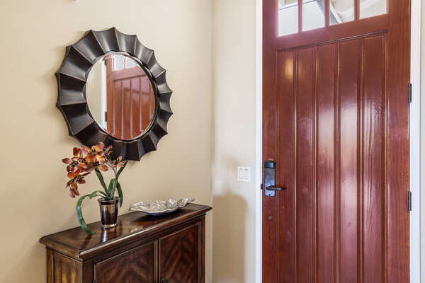 Entryway with Round Mirror and Wooden Console