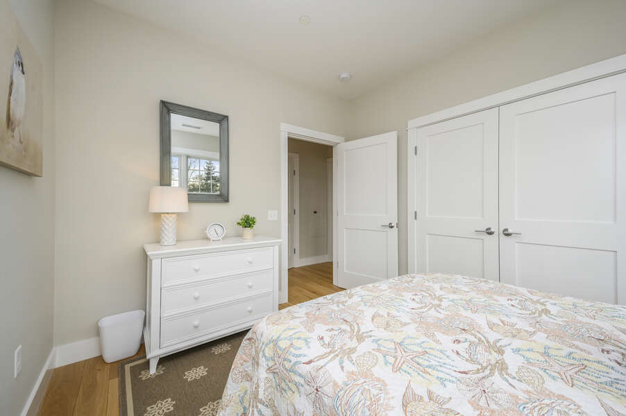 A Bright room with Queen size bed with dresser and large closet. Unit 204, 557 Route 28, Harwich Port, Cape Cod, New England Vacation Rentals