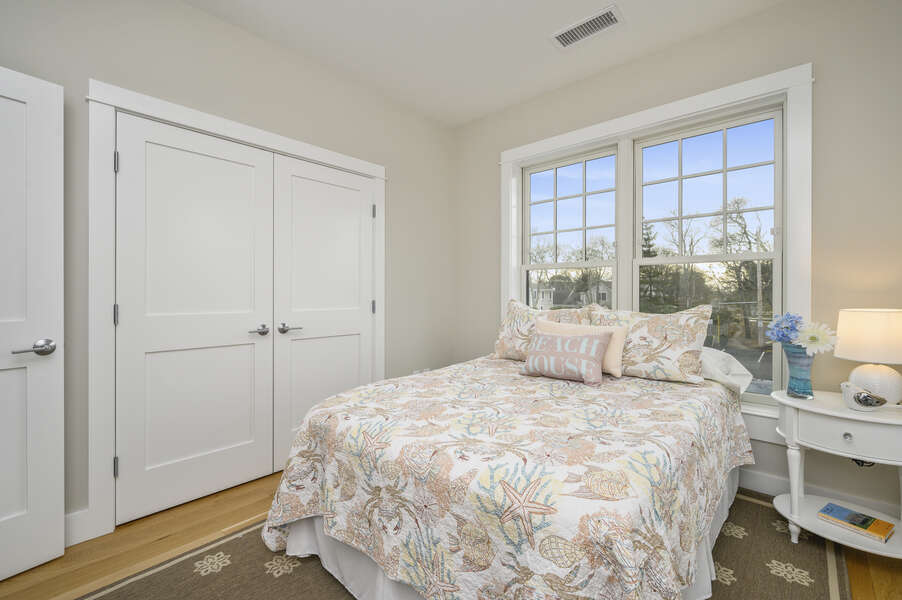 A Bright room with a  Queen bed with night stand and large closet. Unit 204, 557 Route 28 ,Harwich Port, Cape Cod, New England Vacation Rentals