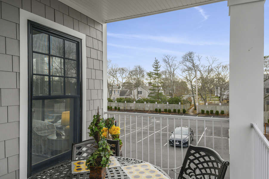 You can see the path in the back of the parking lot from the balcony that leads to the beach! Unit 204, 557 Route 28, Harwich Port, Cape Cod, New England Vacation Rentals