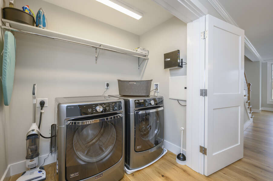 Laundry room is located across from kitchen. Unit 203, 557 Route 28, Harwich Port, Cape Cod, New England Vacation Rentals