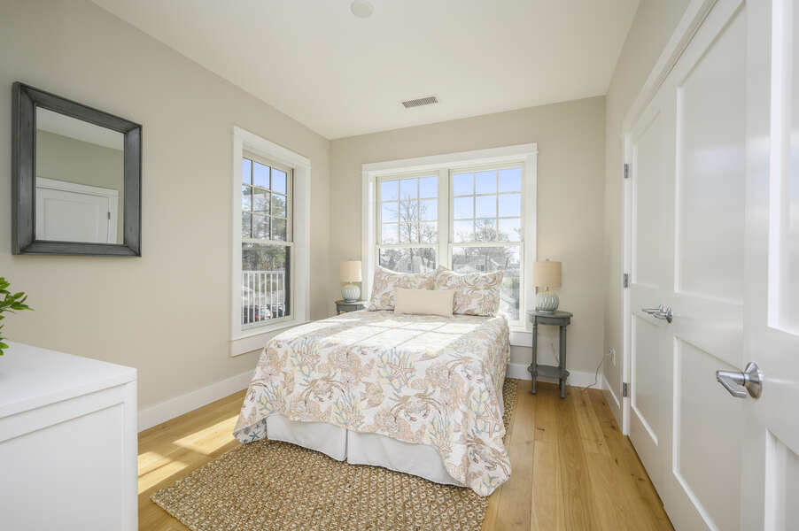 A bright room with Queen bed with dresser ,2 night stands and large closet. Unit 203, 557 Route 28, Harwich Port, Cape Cod, New England Vacation Rentals