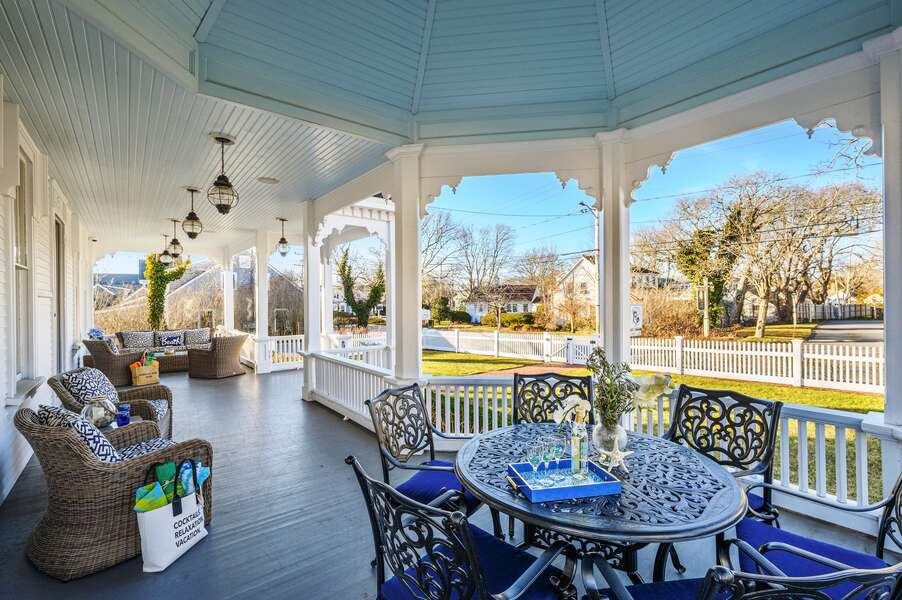 The Grand front porch of The Mooring. Overlooking Route 28, Harwich Port, Cape Cod, New England Vacation Rentals