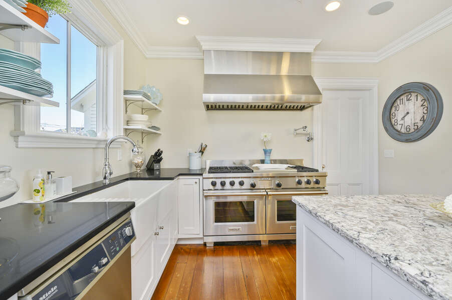 Chef's kitchen with gourmet range and ovens, Large farmer's sink, dishwasher, ample counter space. 525 Route 28, Harwich Port, Cape Cod, New England Vacation Rentals