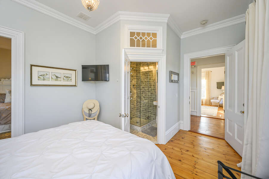 The Key West bedroom, with ensuite bathroom and interior access to the Edgartown bedroom. 525 Route 28, Harwich Port, Cape Cod, New England Vacation Rentals
