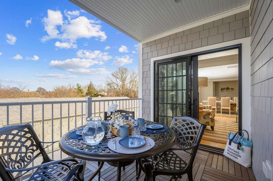 Start your day on the lovely covered balcony off the living room. Unit 201, 557 Route 28 Harwich Port, Cape Cod, New England Vacation Rentals