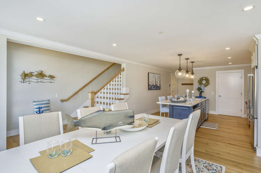 Adjoining dining area that looks into the kitchen. Dining table seats 6. Unit 201,  557 Route 28 Harwich Port, Cape Cod, New England Vacation Rentals  