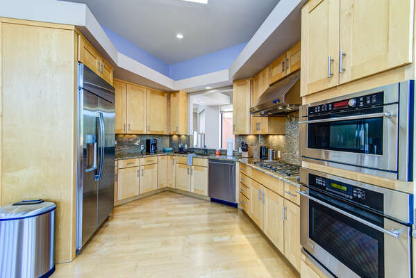 Fully Equipped Kitchen with Stainless Appliances, Stone Countertops and All Utensils Needed for the Chef in the Group