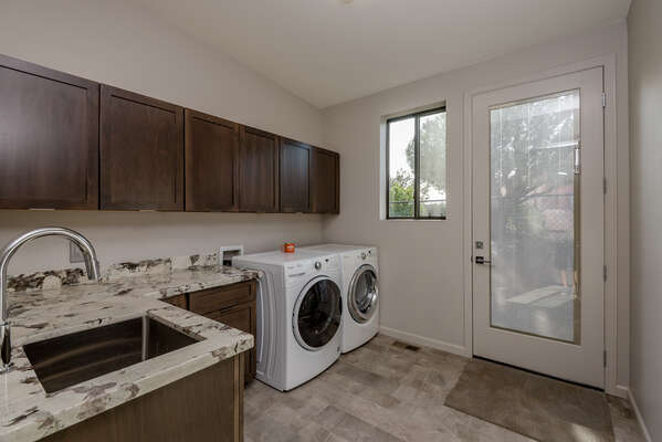 Laundry Room with a Full-size Washer and Dryer, Sink and Exterior Access
