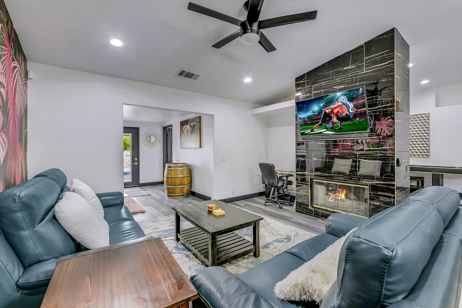 The main living space is the perfect spot to relax and watch the game on the Smart television.