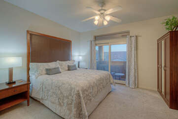 Fourth bedroom has a king bed, TV, ceiling fan and a private balcony for romantic moments with that special someone.