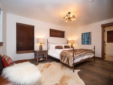 Main level master bedroom with attached private bathroom