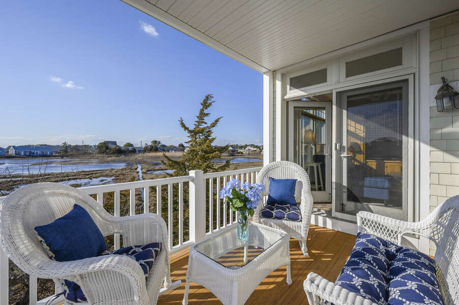 Back deck off of the living room with seating for 5 with wonderful marsh views. 27 Fiddlers Green Lane-Dennis Port-New England Vacation Rentals